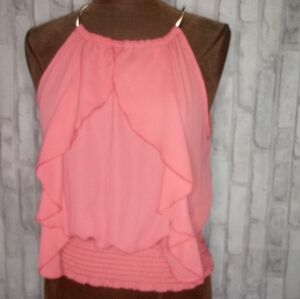 Fashion magazine ruffled waterfall tunic top